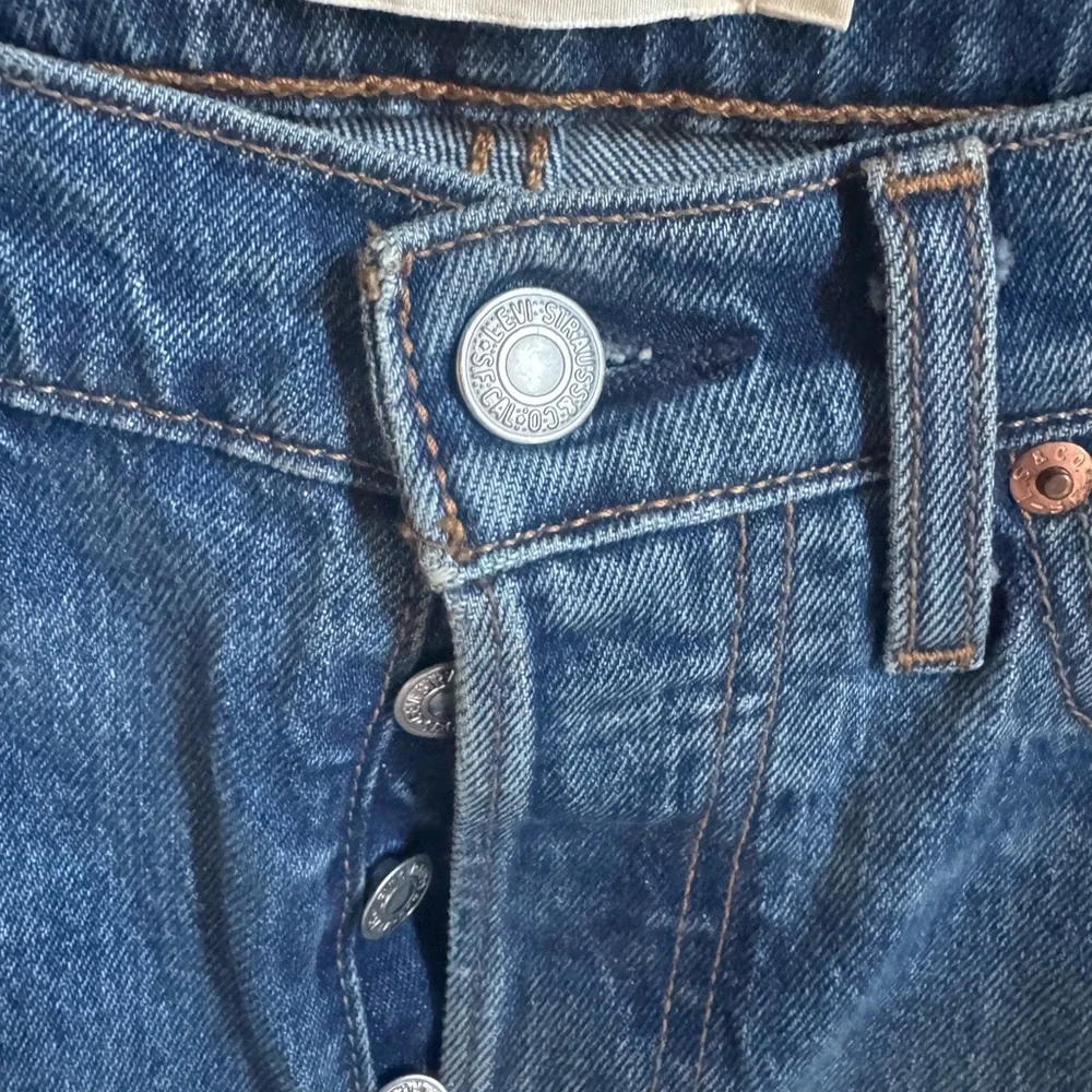 Upcycled Grommet design button fly Levi’s size 28